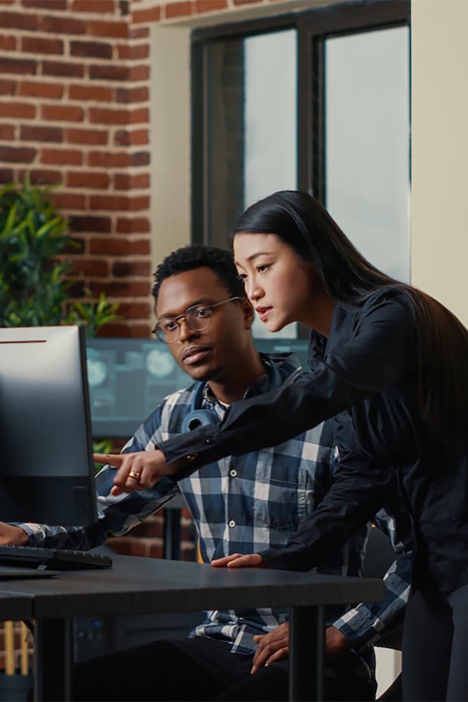 Hackybara-cyber security marketplace-software-developers-holding-laptop-lg portrait